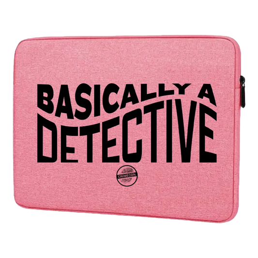 Pink laptop sleeve with black text reading ’BASICALLY A DETECTIVE’.