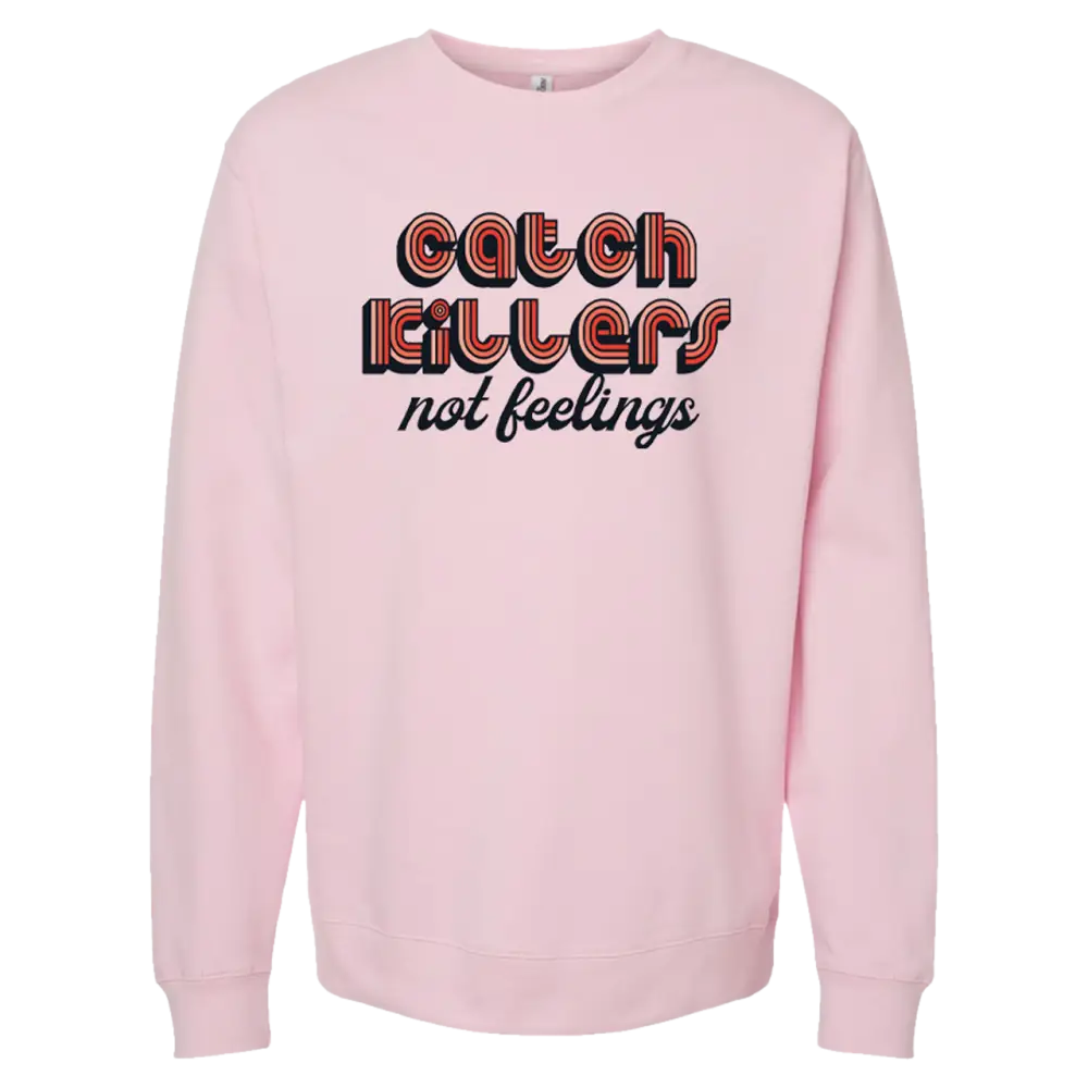 Pink sweatshirt with retro-style text saying ’Catch killers not feelings’.