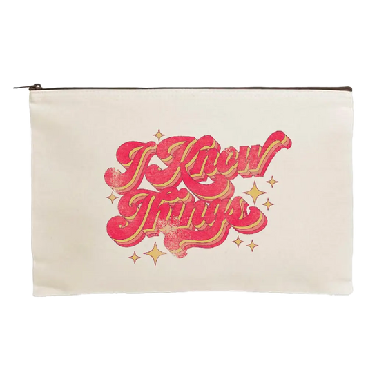 Canvas pouch with retro-style ’I Know Things’ text design in pink and orange.