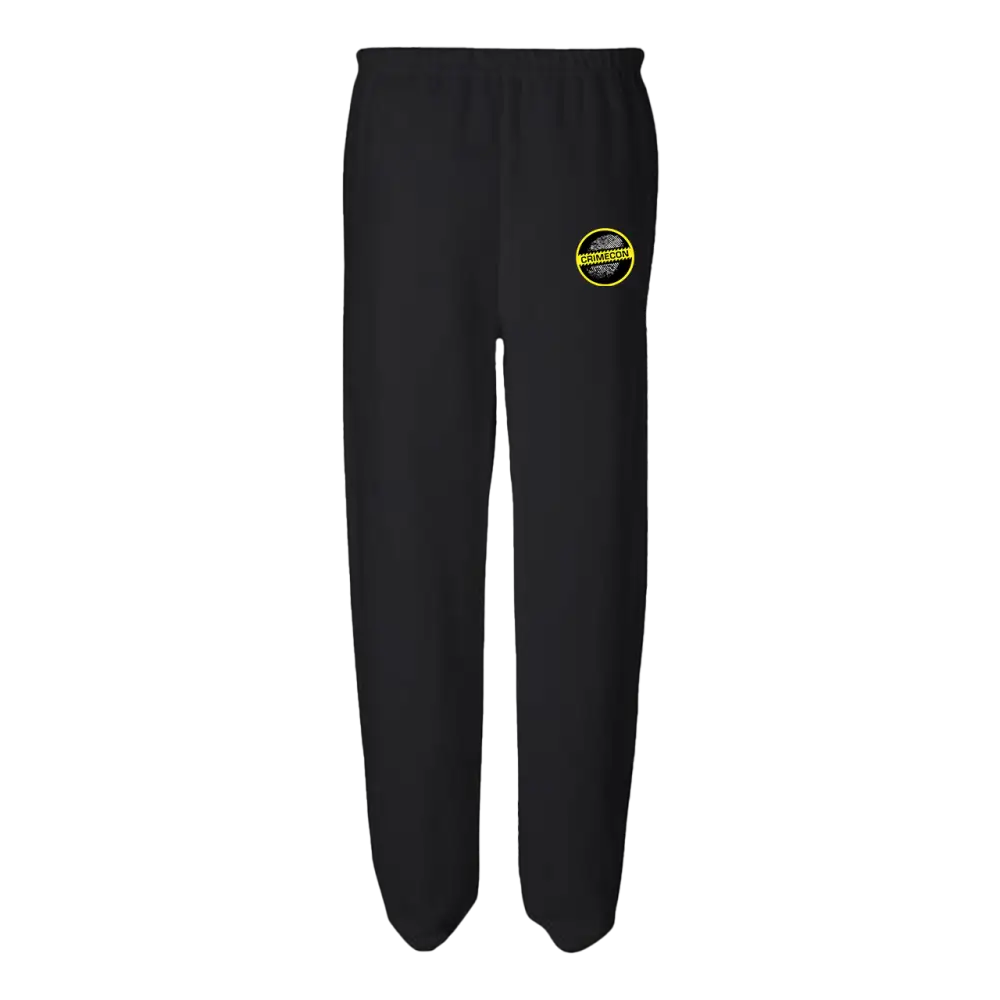 Black sweatpants with a small yellow circular logo on the left thigh.