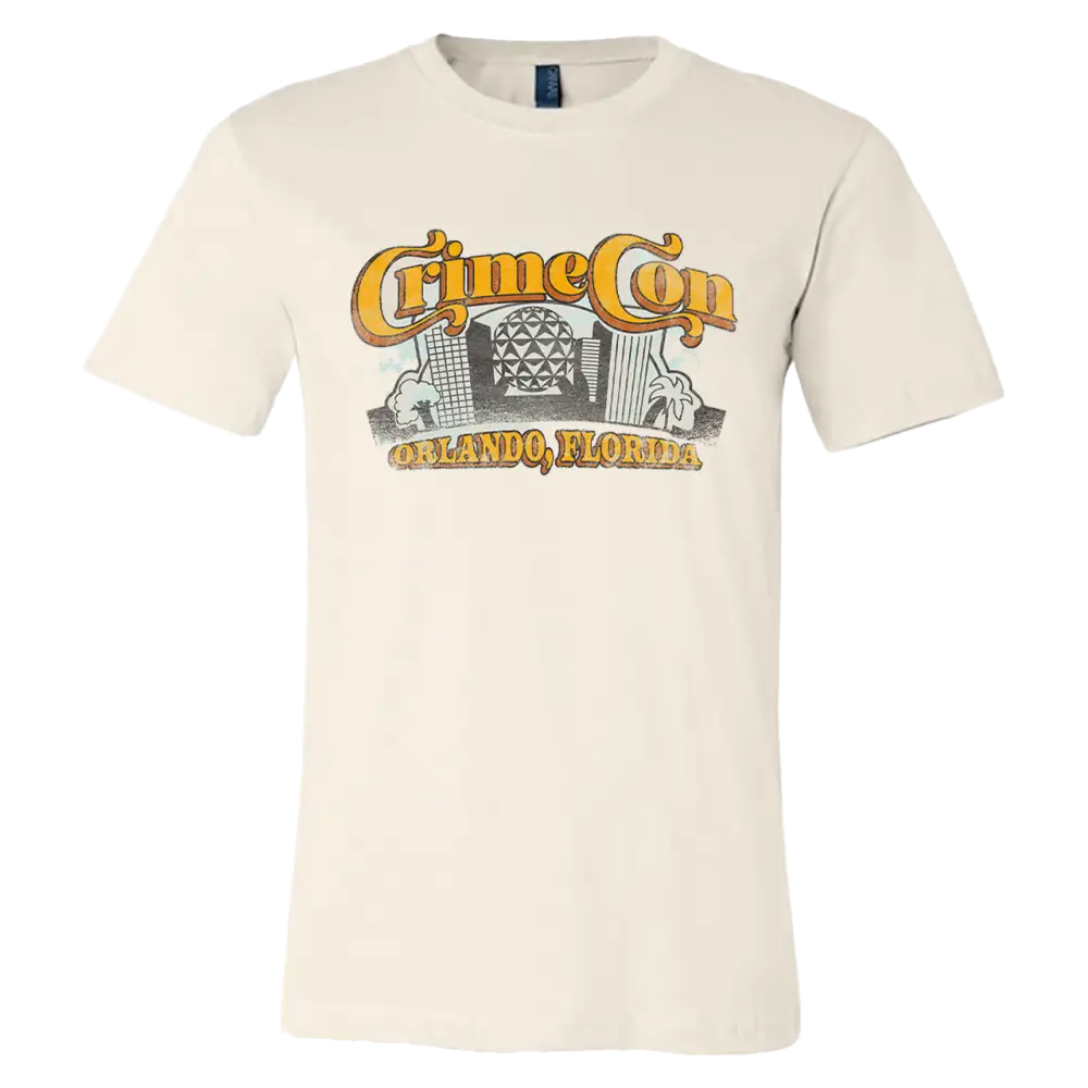 Cream-colored t-shirt with a ’Crime City’ graphic design featuring buildings and text.