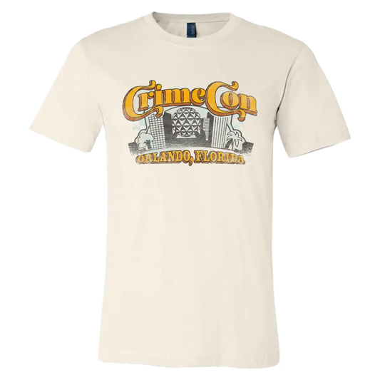 Cream-colored t-shirt with a ’Crime City’ graphic design featuring buildings and text.